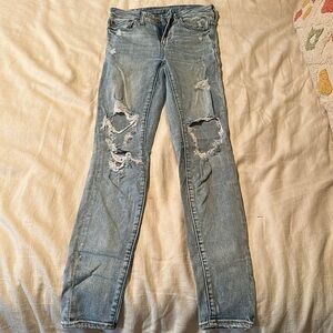 American Eagle light wash ripped jeans.